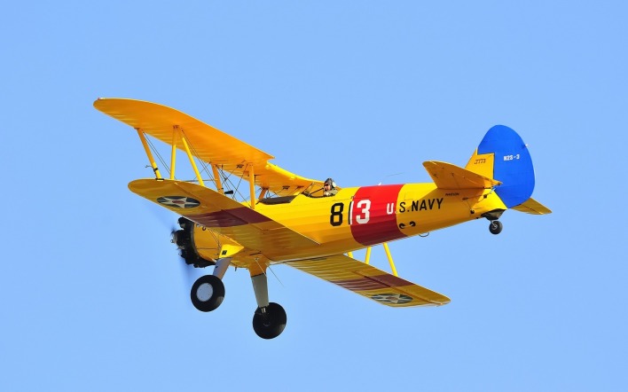самолет желтый полет пропеллер одномоторный