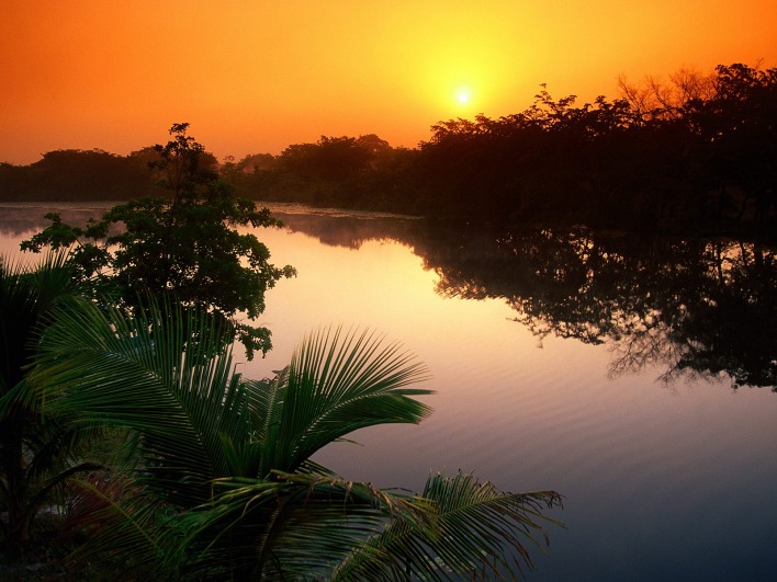 Sun Rising Over the New River, Belize