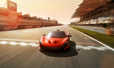 Красный спортивный автомобиль гонка mclaren p1
