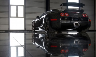 черный спортивный автомобиль bugatti veyron mansory