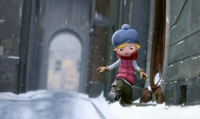 Мальчишка в городе на снегу