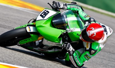 мотоцикл зеленый вираж гонщик