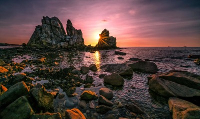 закат скалы камни море