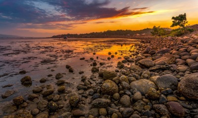 камни берег побережье на закате