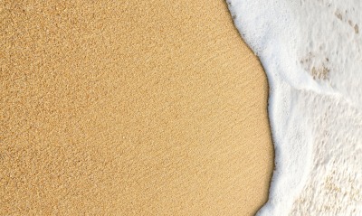 песок волна пена крупный план