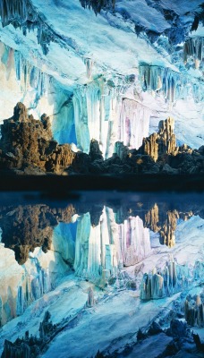 Stalactites and Stalagmites Reflected in Reed Flute Cave, Guilin, China