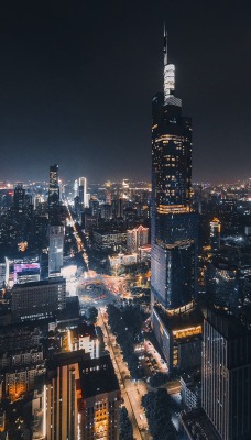ночь город огни здания вид с высоты