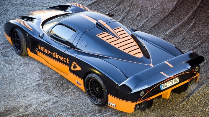 черный оранжевый автомобиль maserati mc12xx