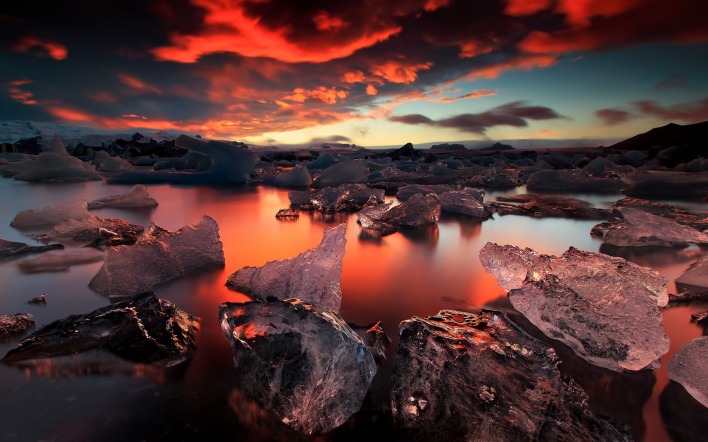 камни закат небо льдины