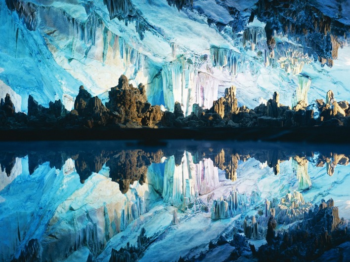 Stalactites and Stalagmites Reflected in Reed Flute Cave, Guilin, China
