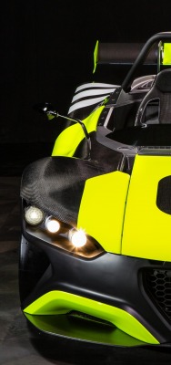 автомобиль гоночный салатовый темный фон вид спереди