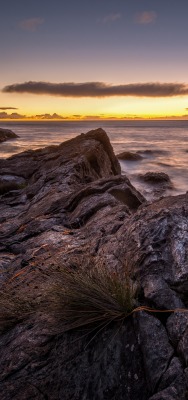 камни скалы берег море вечер