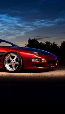 красный автомобиль Nissan 300ZX