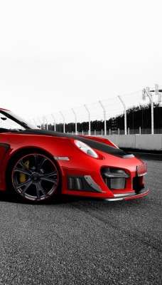 красный спортивный автомобиль porsche 911 gt2 rs