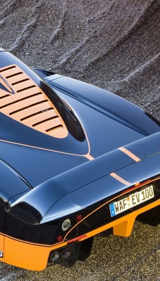 черный оранжевый автомобиль maserati mc12xx