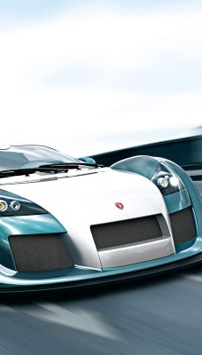 синий спортивный автомобиль Gumpert Apollo