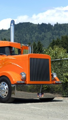 Peterbit грузовик оранжевый