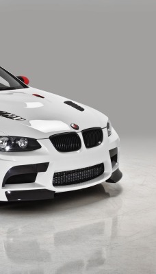 белый спортивный автомобиль bmw m3 e92