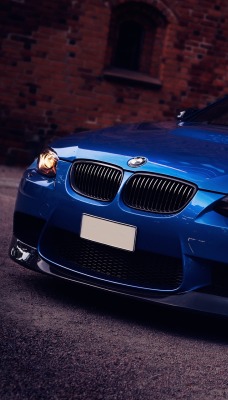 синий автомобиль BMW M3