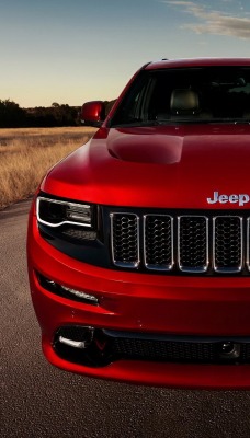 красный автомобиль джип Jeep Grand Cherokee SRT