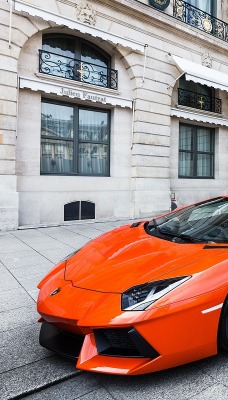 оранжевый автомобиль Lamborghini aventador