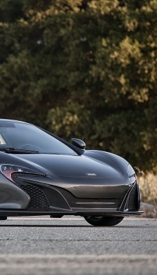 черный автомобиль McLaren 650S