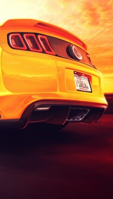 желтый автомобиль ford mustang boss 302