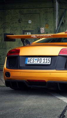 желтый автомобиль audi r8 prior