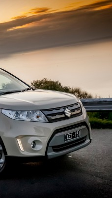 автомобиль белый suzuki grand vitara