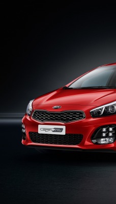 красный автомобиль kia ceed