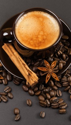 кофе блюдце кофейные зерна палочка корицы анис