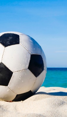 футбольный мяч море пляж песок небо горизонт