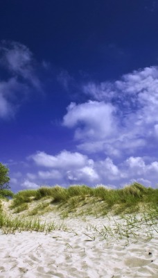 Белоснежный песчаный холм