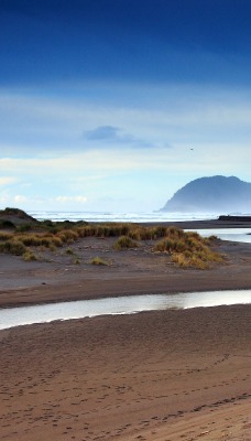 горы песок небо вода