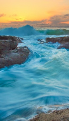 камни воды прибой небо