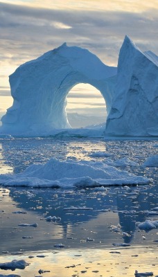 айсберг арка море глыбы небо