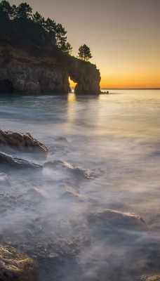 берег камни скалы море закат скала