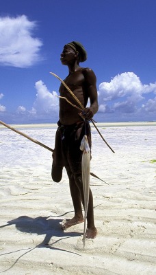 Fisherman on the Beach at Low Tide, Zanzibar, Tanzania