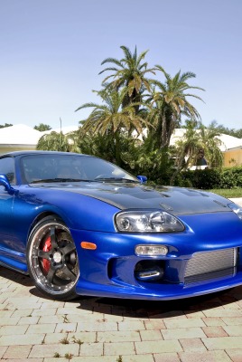 синий автомобиль toyota supra mk4