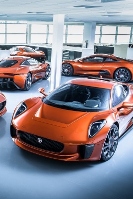 спортивный автомобиль оранжевые Jaguar C-X75