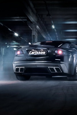 черный спортивный автомобиль carlsson c25