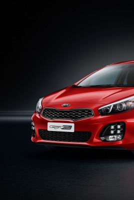 красный автомобиль kia ceed