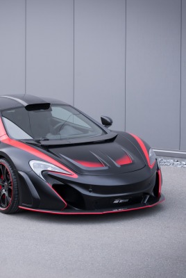 черный спортивный автомобиль mclaren 650s