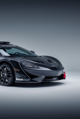 автомобиль черный McLaren MSOx