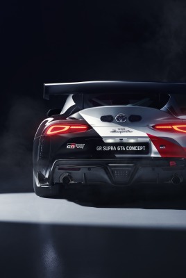 toyota supra вид сзади спойлер дым