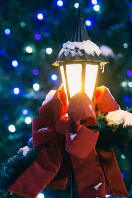 новый год рождество фонарь огоньки боке банты ели