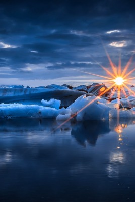 озеро лед глыбы солнце закат