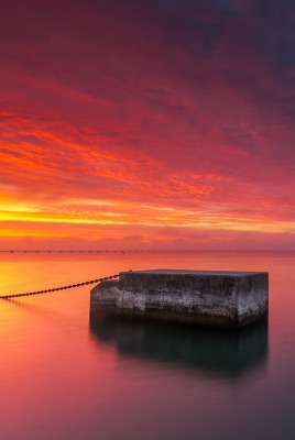 закат море бетонная плита