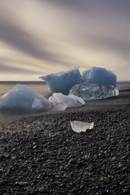 льдины песок пляж море