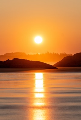 солнце рассвет над водой